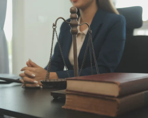 judge-gavel-with-justice-lawyers-having-team-meeting-law-firm-background-concepts-law-legal-services-1-1-scaled